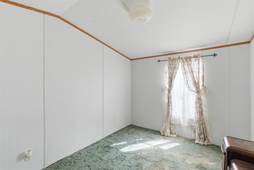 144 Oak Meadows Drive Springtown, TX 76082 - Photo 16 of 24 a view of an empty room
