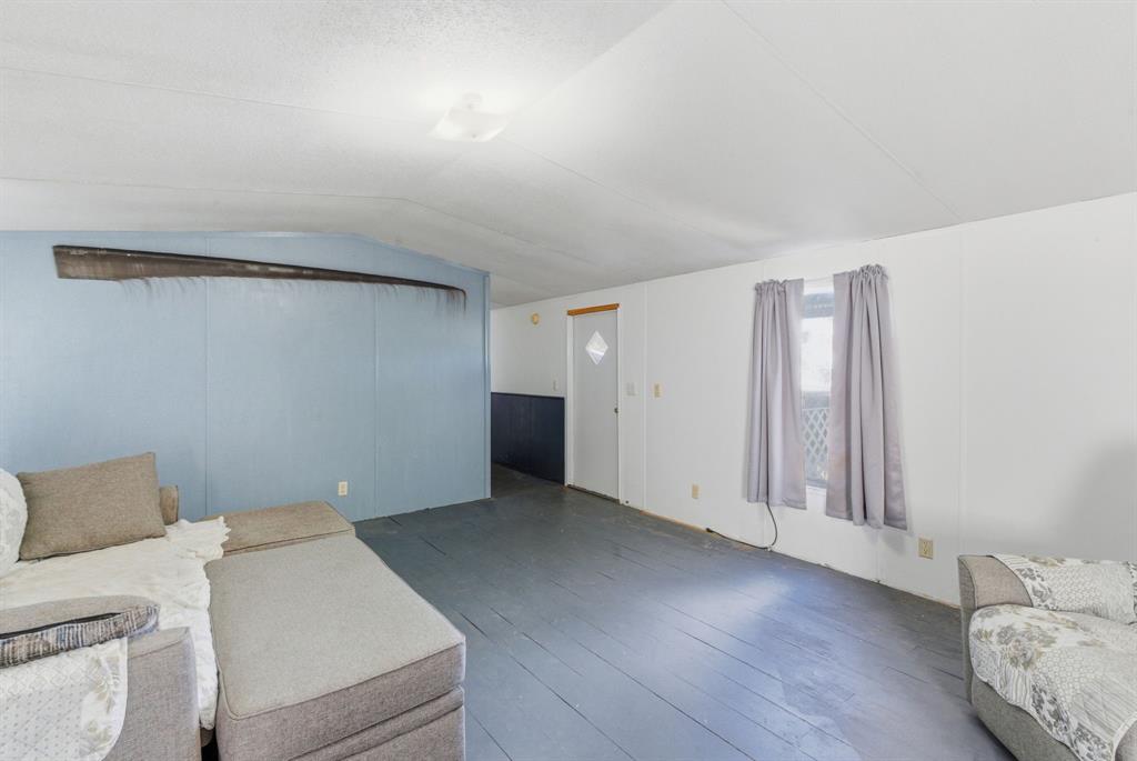 144 Oak Meadows Drive Springtown, TX 76082 - Photo 4 of 24 a view of livingroom with furniture and wooden floor
