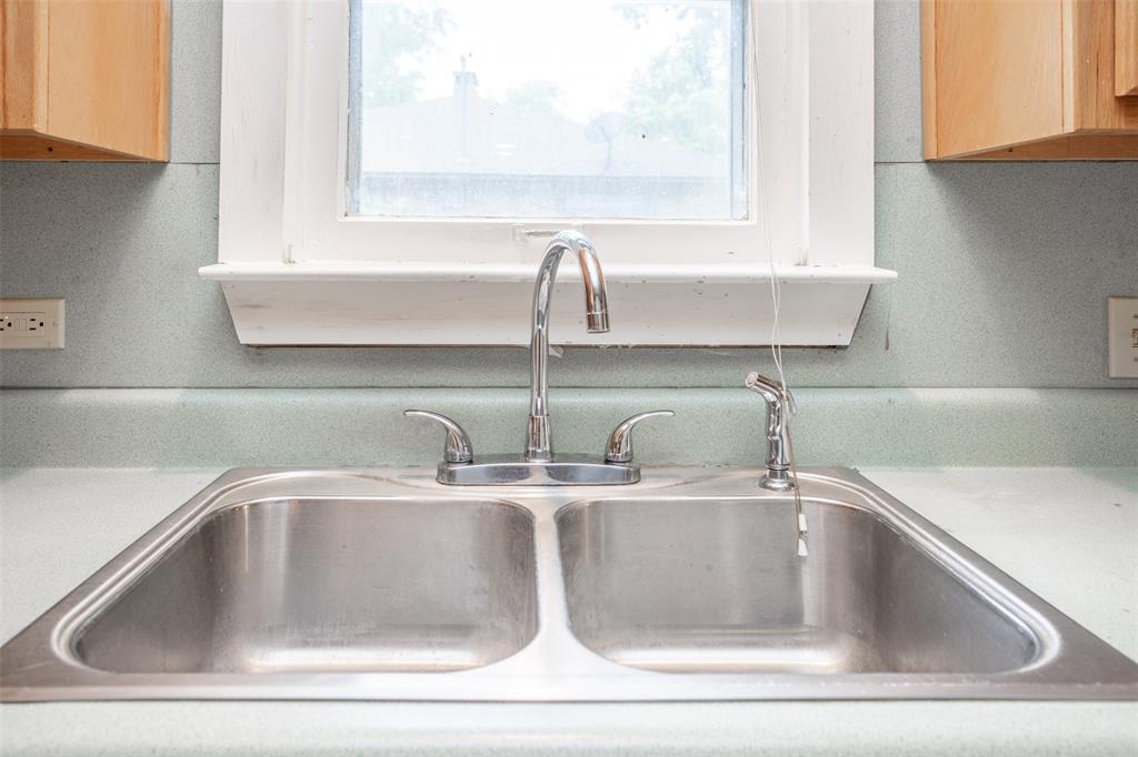 206 Ritchey Street Gainesville, TX 76240 - Photo 13 of 36 a close view of sink and tap