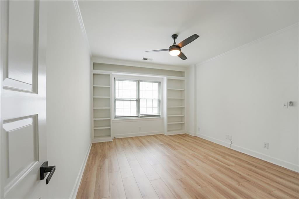 3649 Peachtree Road Northeast, Unit 305 Atlanta, GA 30319 - Photo 28 of 58 a view of room with window and hardwood floor