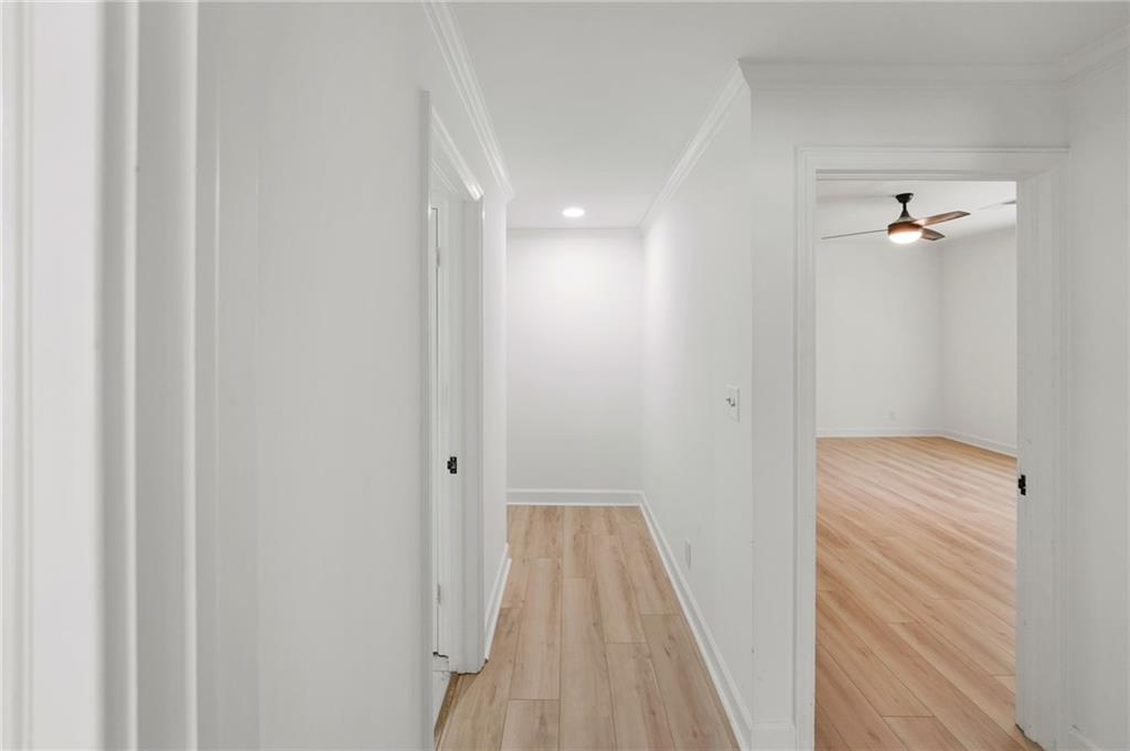 3649 Peachtree Road Northeast, Unit 305 Atlanta, GA 30319 - Photo 48 of 58 a view of a room with wooden floor