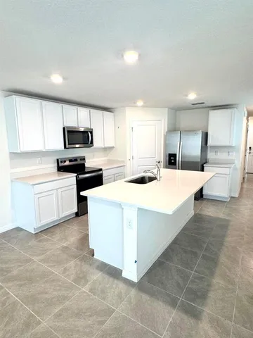 a view of entryway with bathroom