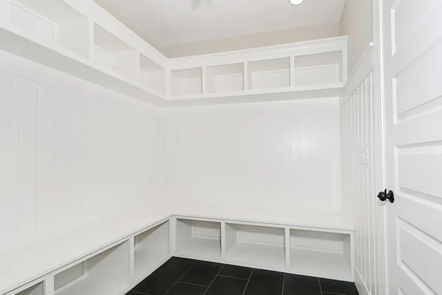 a view of an empty walk in closet
