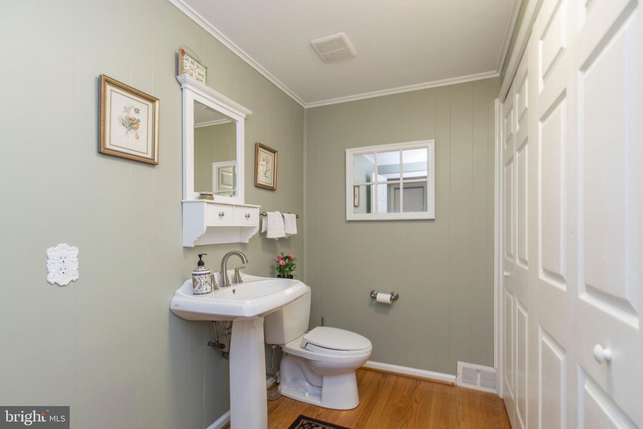 902 Preston Road Glenside, PA 19038 - Photo 25 of 34 Large powder room with laundry behind doors