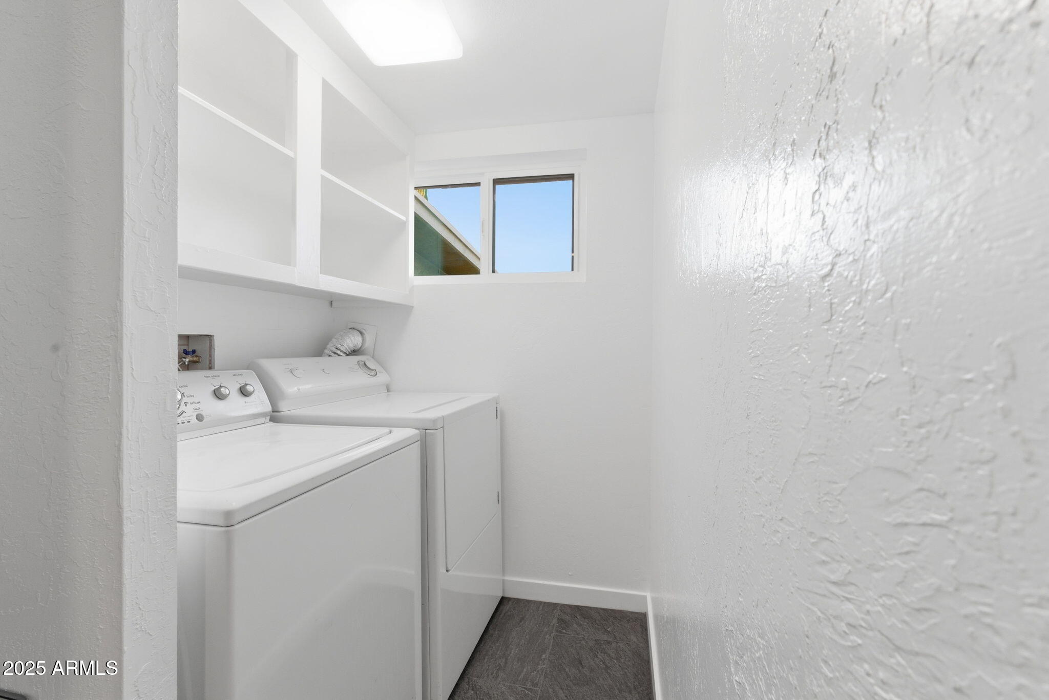 36975 North Sunset Trail Cave Creek, AZ 85331 - Photo 17 of 26 a utility room with dryer and washer