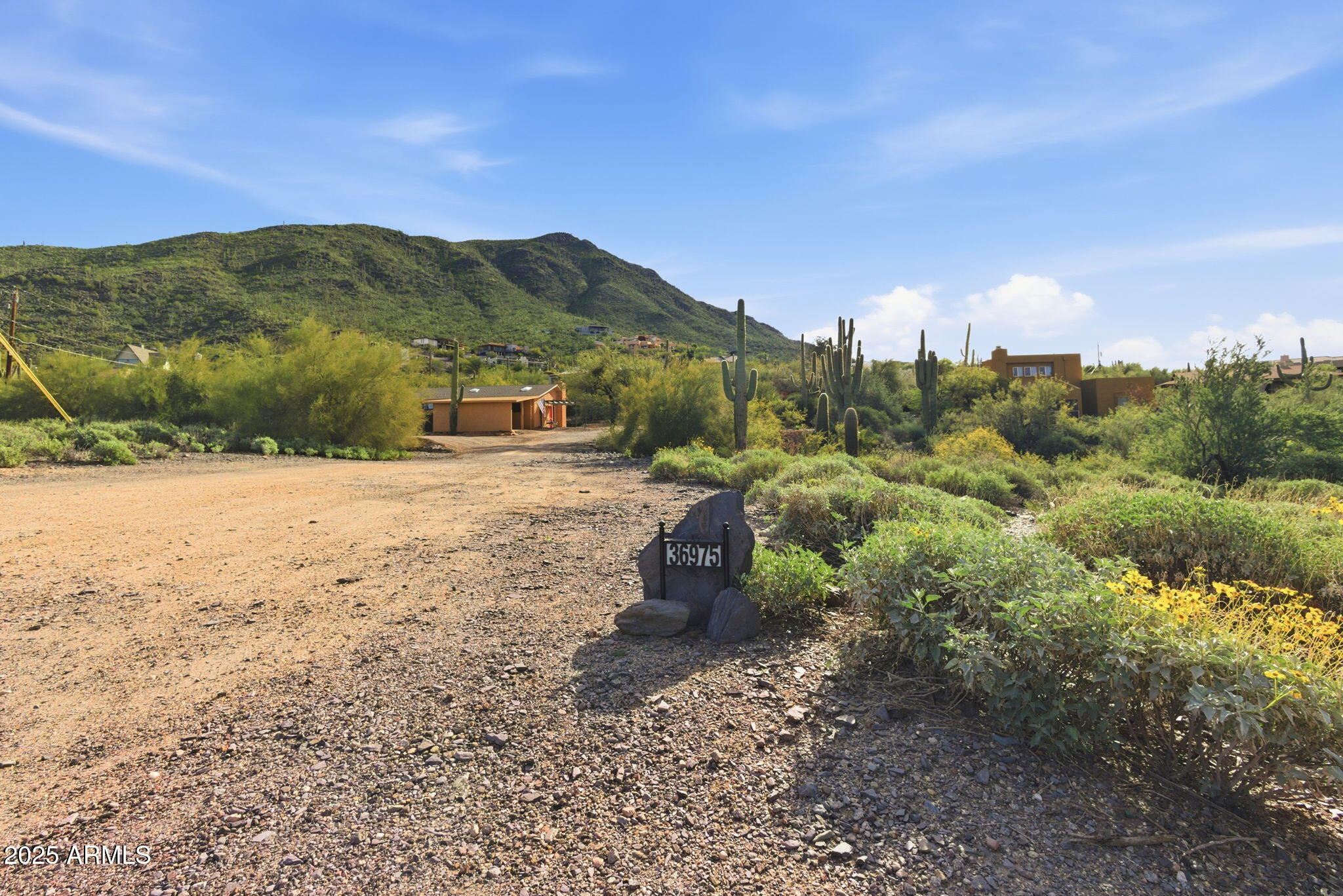 36975 North Sunset Trail Cave Creek, AZ 85331 - Photo 18 of 26 a view of a town with mountains in the background
