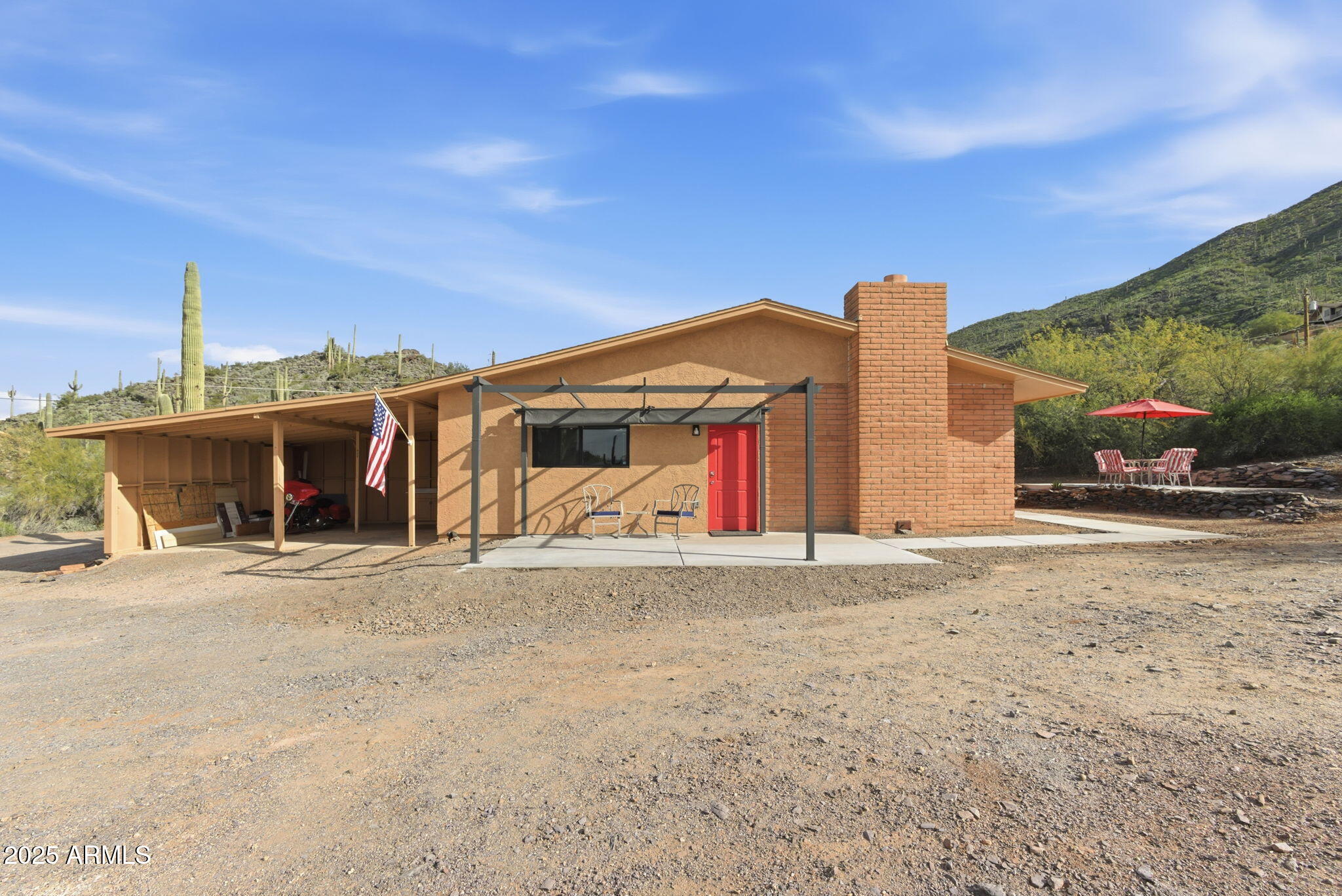 36975 North Sunset Trail Cave Creek, AZ 85331 - Photo 23 of 26 a front view of a house with a yard and garage