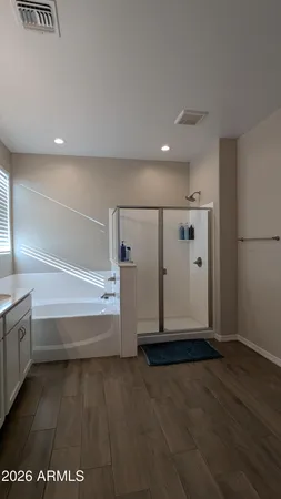 a view of entryway with wooden floor