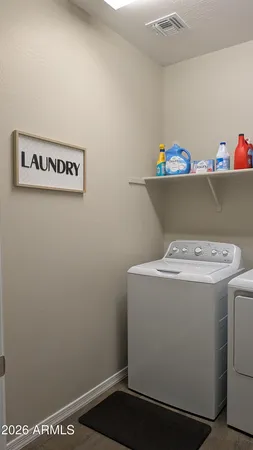 a utility room with dryer and washer