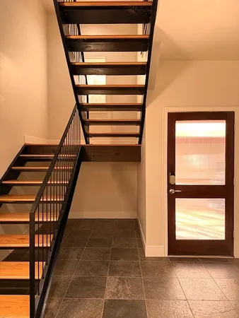 a view of entryway with a front door