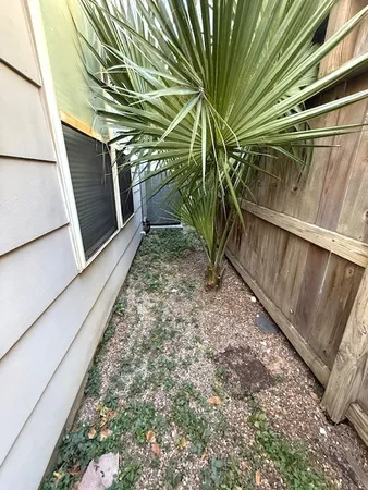 a view of a yard with wooden stairs