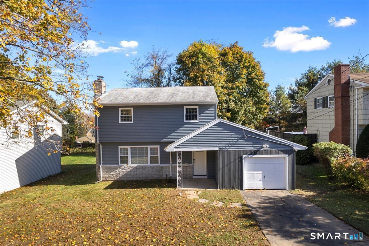 114 Daniel Road Hamden, CT 06517 - Photo 26 of 32 a front view of a house with a yard