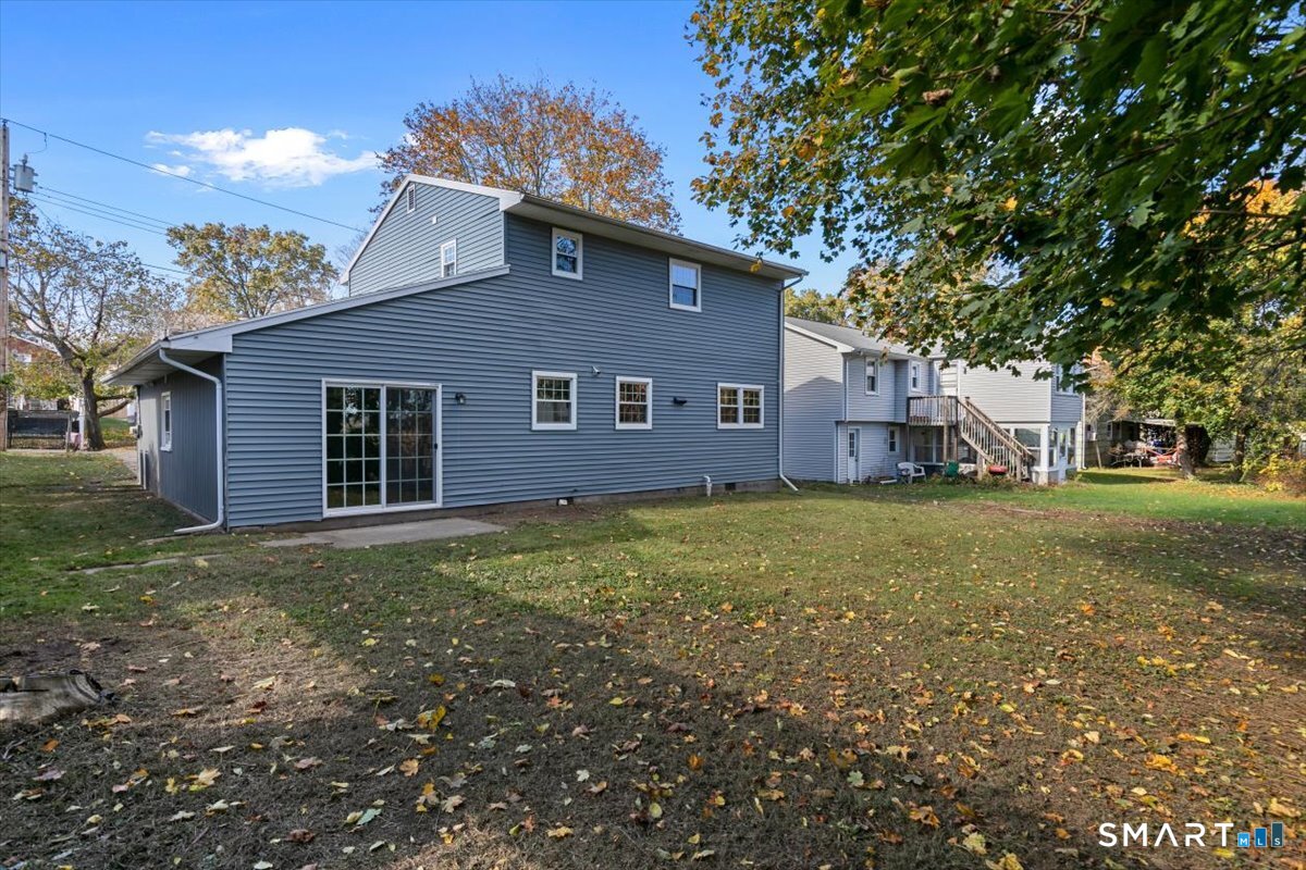 114 Daniel Road Hamden, CT 06517 - Photo 30 of 32 a view of a house with a yard