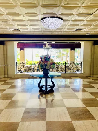 a view of entryway with a chandelier