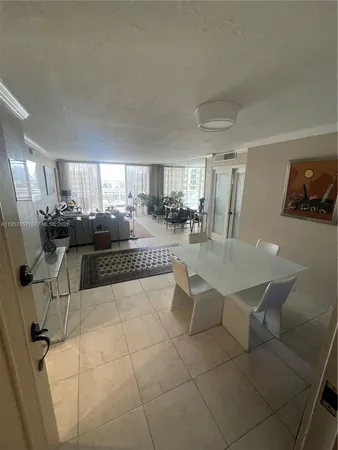 a kitchen with a sink stainless steel appliances and cabinets