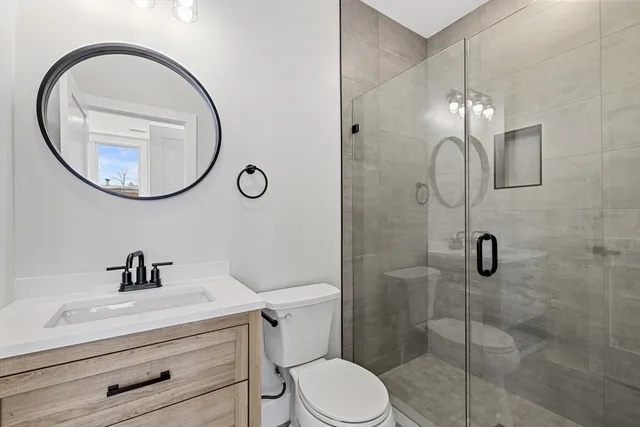 a view of a balcony with wooden floor and city view