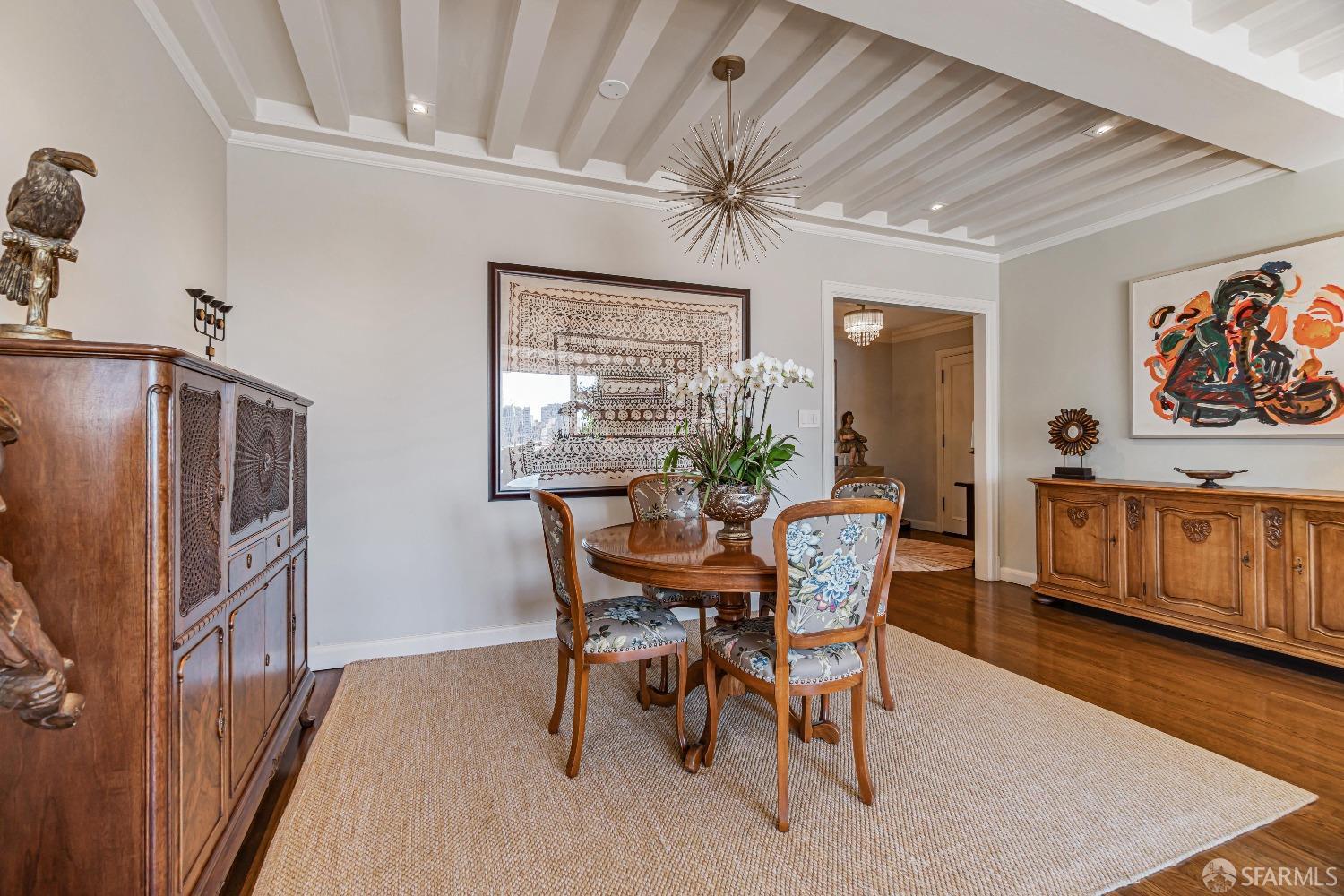 850 Powell Street, Unit 603 San Francisco, CA 94108 - Photo 21 of 47 a dining room with furniture and window