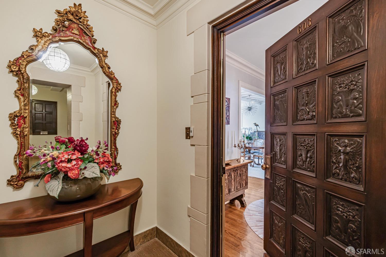 850 Powell Street, Unit 603 San Francisco, CA 94108 - Photo 5 of 47 a dining room with furniture and wooden floor