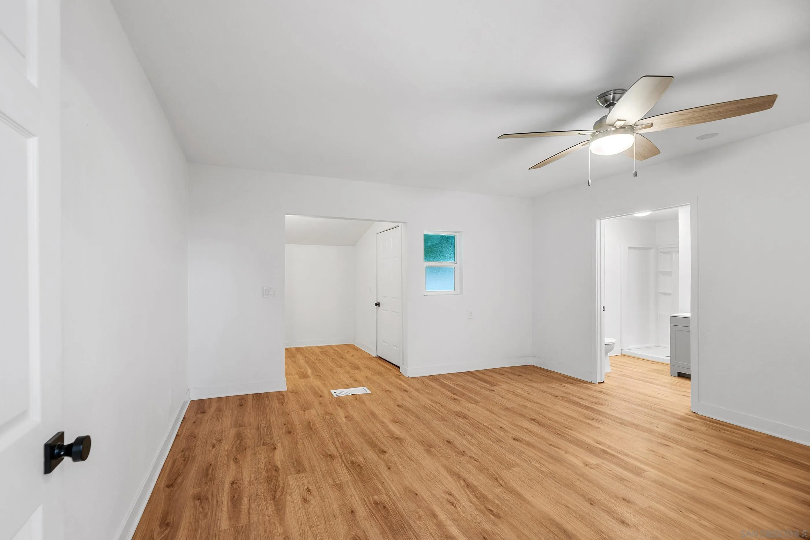 628 Paraiso Avenue Spring Valley, CA 91977 - Photo 19 of 38 a bedroom with a bed and a ceiling fan