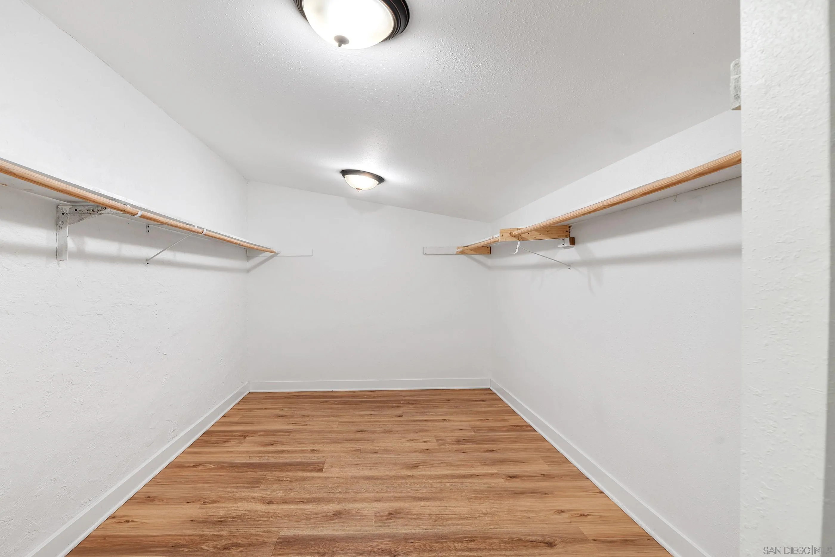 628 Paraiso Avenue Spring Valley, CA 91977 - Photo 23 of 38 a view of a room with wooden floor