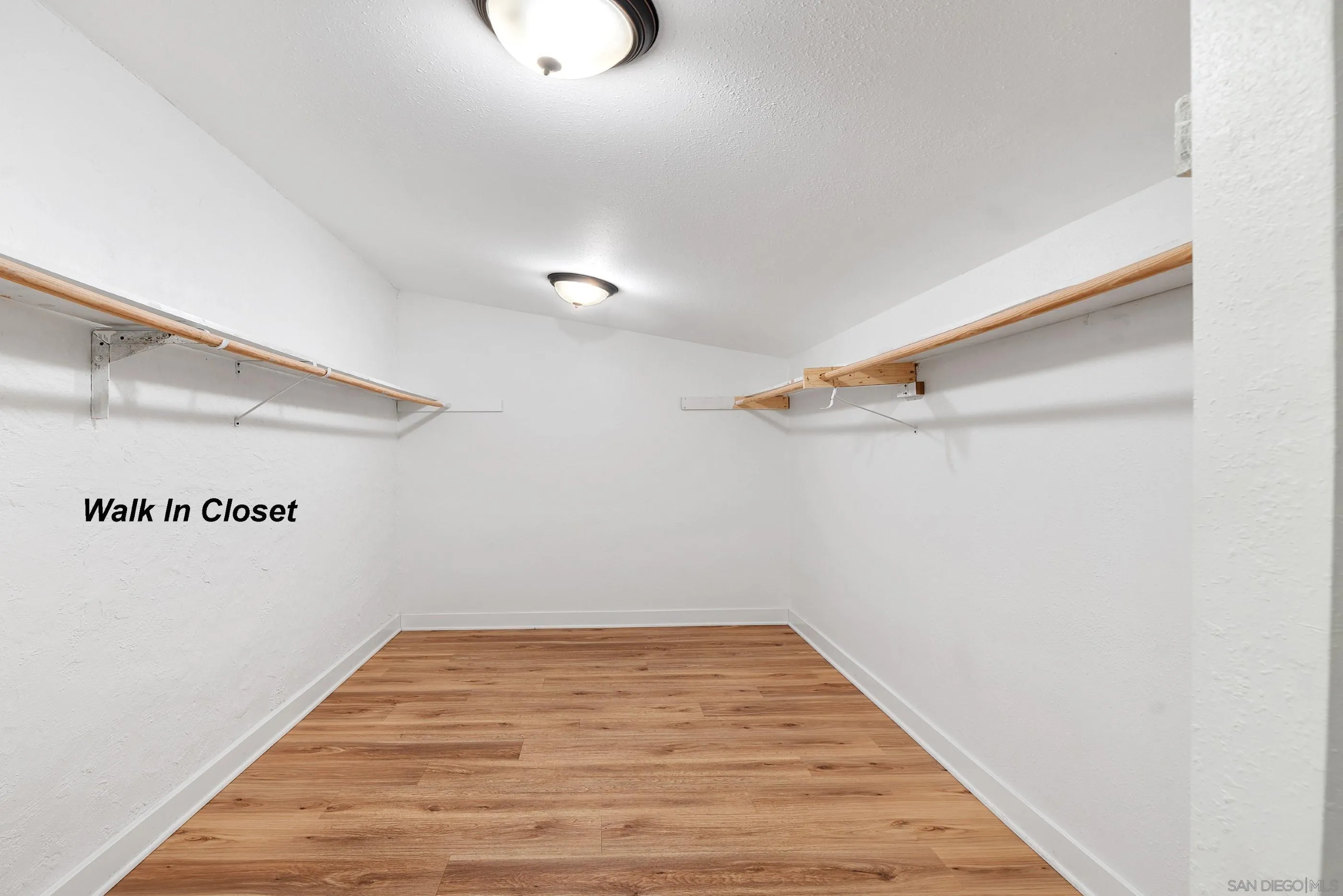 628 Paraiso Avenue Spring Valley, CA 91977 - Photo 24 of 38 a view of a room with wooden floor