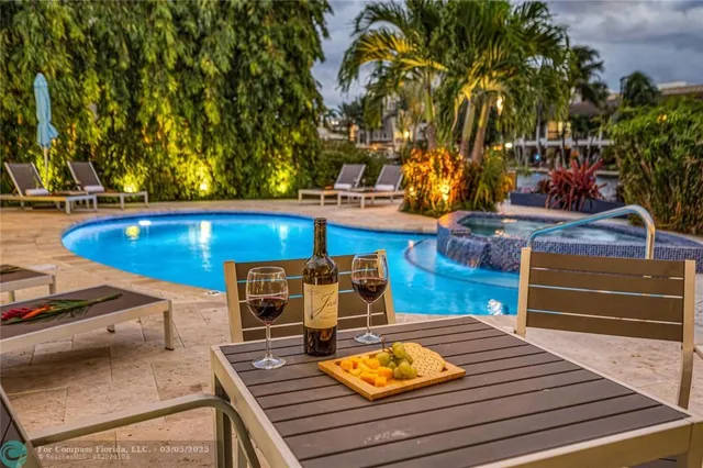 a view of a chairs and table on the wooden roof