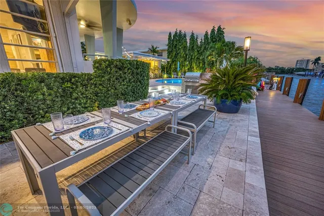 a view of a chairs and table on the terrace