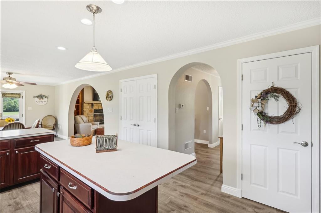 174 Hollow Road Darlington, PA 16115 - Photo 21 of 50 a view of a kitchen with a table and chairs