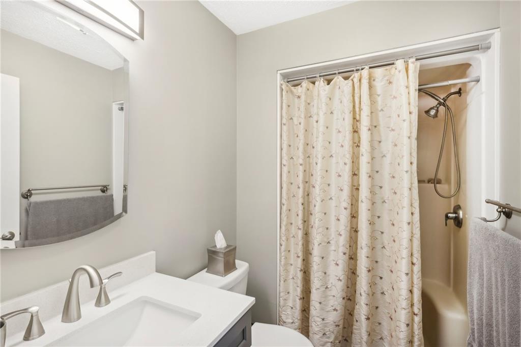 174 Hollow Road Darlington, PA 16115 - Photo 25 of 50 a bathroom with a sink a toilet and shower