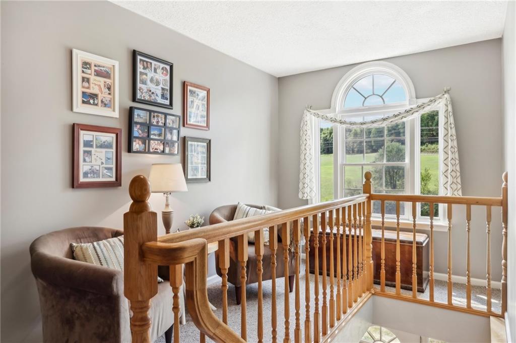 174 Hollow Road Darlington, PA 16115 - Photo 27 of 50 a view of a dining room with furniture wooden floor and a window