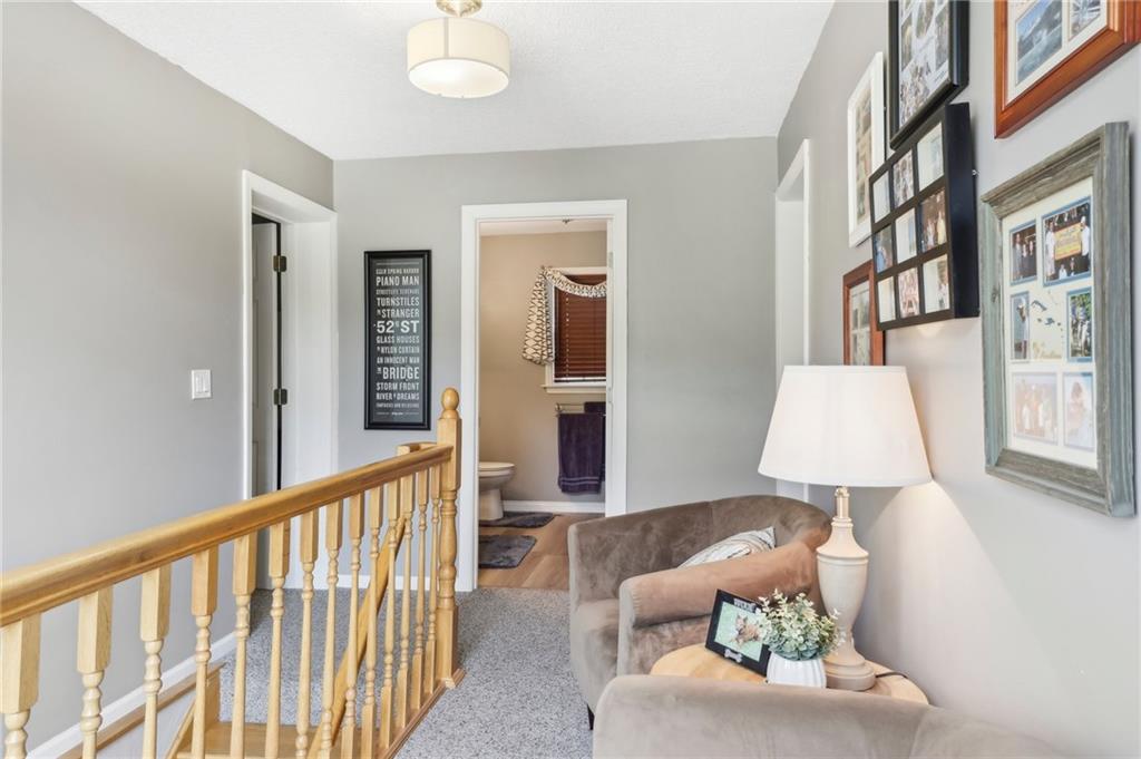 174 Hollow Road Darlington, PA 16115 - Photo 28 of 50 a living room with furniture and a lamp