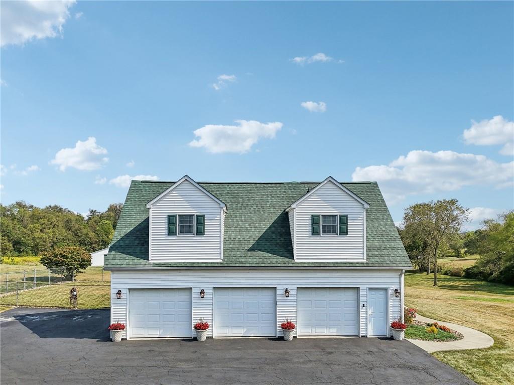 174 Hollow Road Darlington, PA 16115 - Photo 3 of 50 a front view of a house with a yard