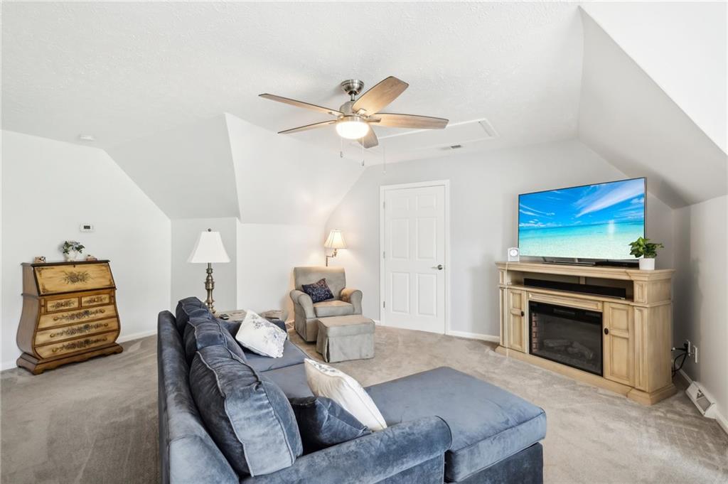 174 Hollow Road Darlington, PA 16115 - Photo 34 of 50 a living room with furniture and a fireplace