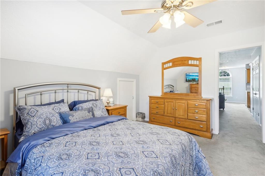 174 Hollow Road Darlington, PA 16115 - Photo 37 of 50 a bedroom with a bed and a dresser