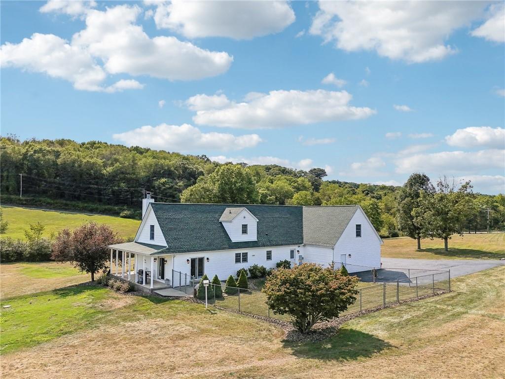 174 Hollow Road Darlington, PA 16115 - Photo 4 of 50 an aerial view of a house with garden space and lake view