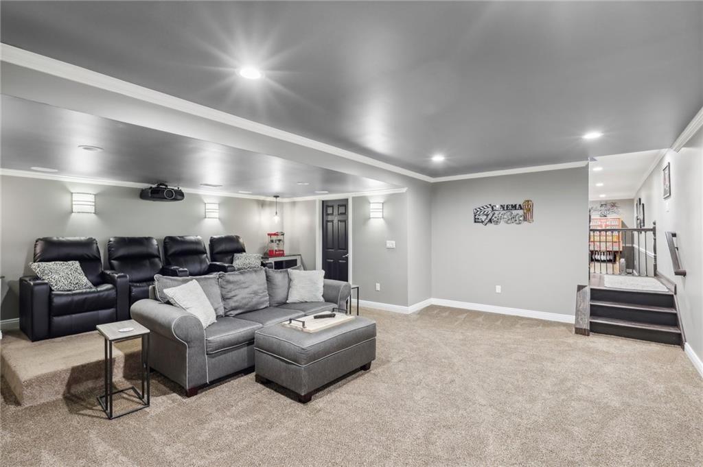 174 Hollow Road Darlington, PA 16115 - Photo 47 of 50 a living room with furniture and a chandelier