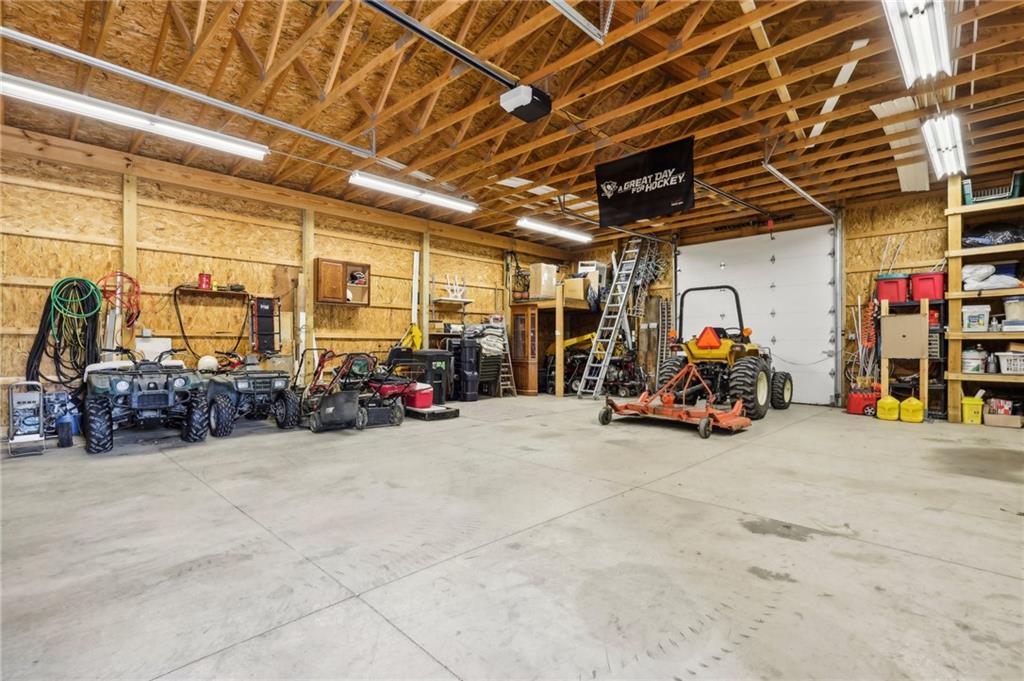 174 Hollow Road Darlington, PA 16115 - Photo 49 of 50 a view of a garage with parked cars