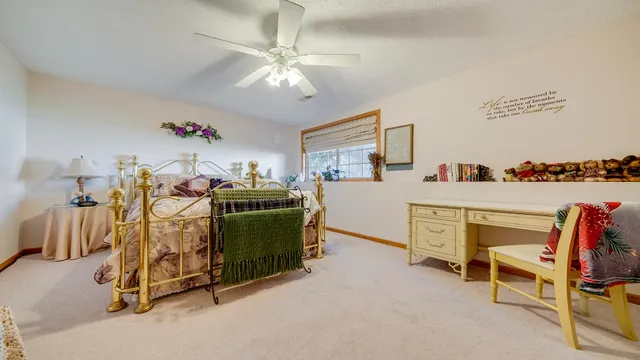 a room with furniture and a flat screen tv