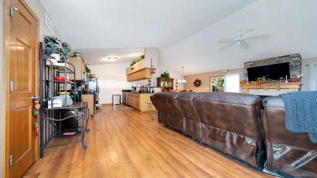 a living room with lots of furniture and a flat screen tv