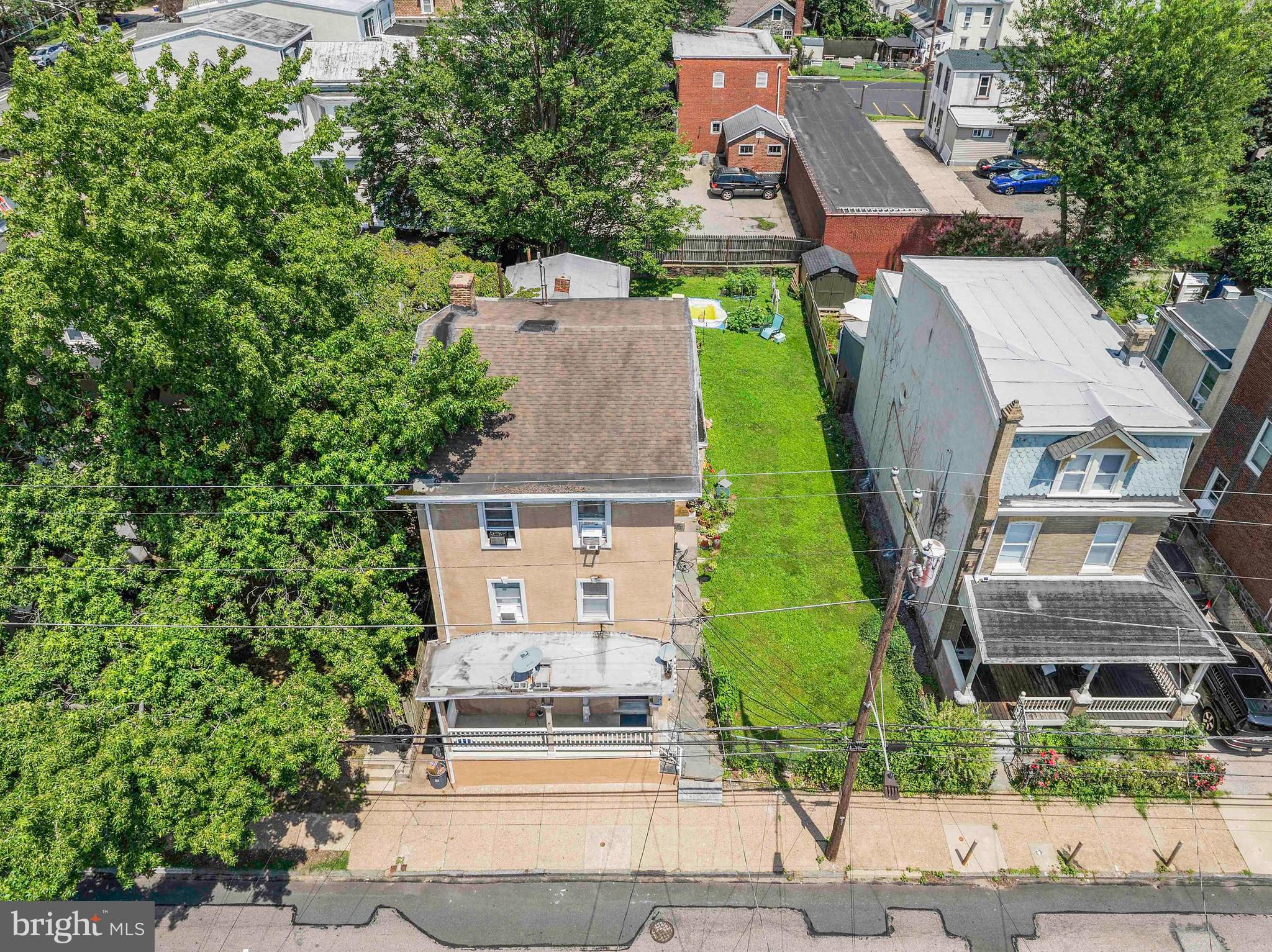 4381 Pechin Street Philadelphia, PA 19128 - Photo 44 of 46 an aerial view of a house with garden space and street view