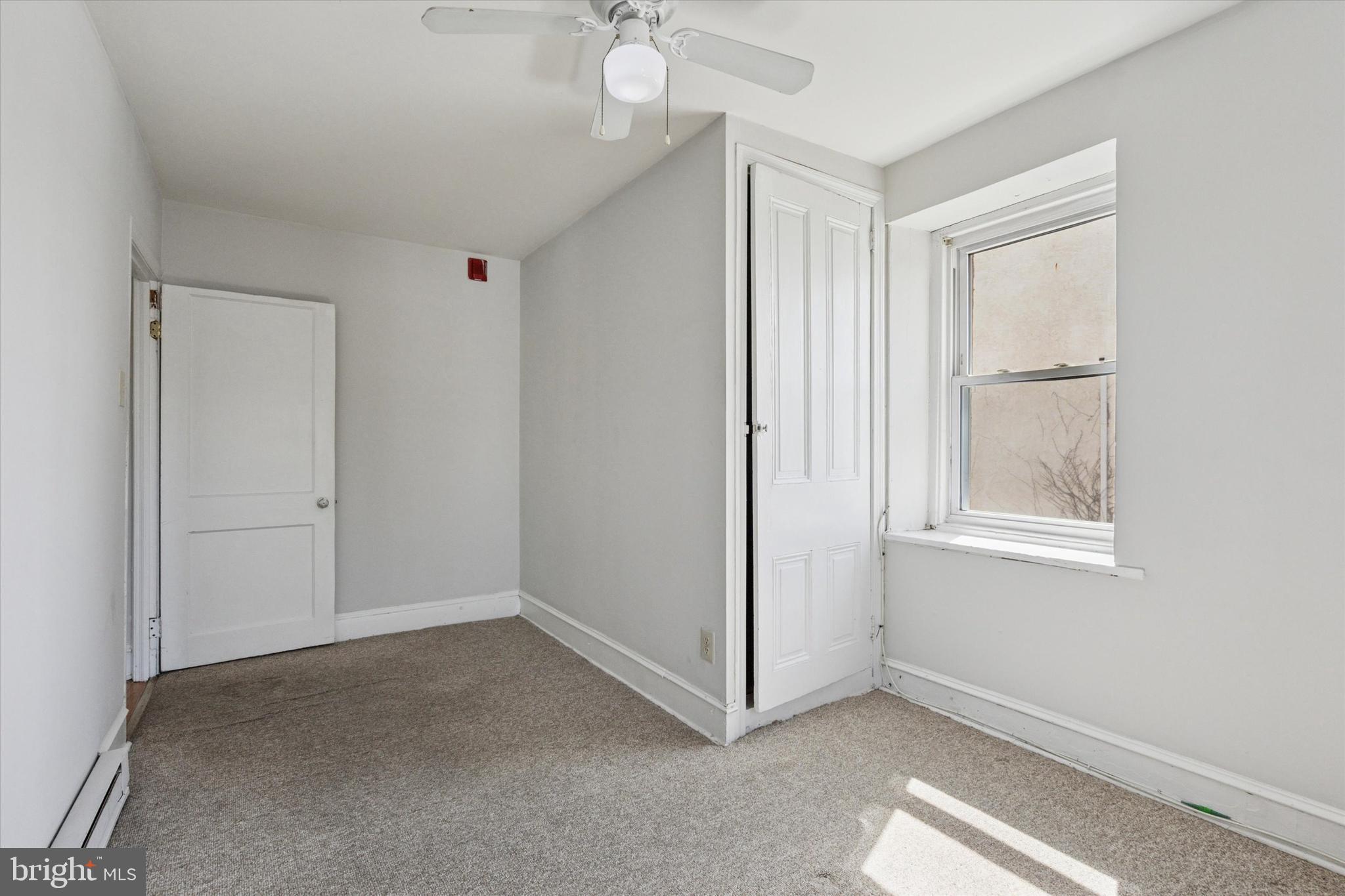 4381 Pechin Street Philadelphia, PA 19128 - Photo 10 of 46 a view of an empty room with a window