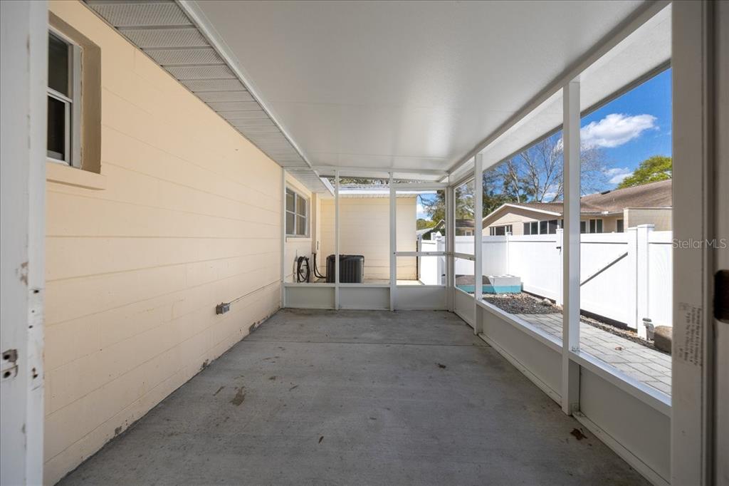 8877 Southwest 96th Street, Unit B Ocala, FL 34481 - Photo 26 of 48 a view of an empty room with a window