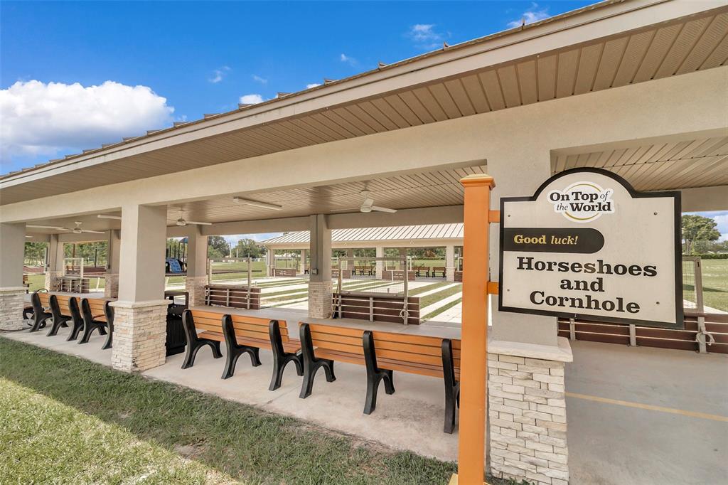 8877 Southwest 96th Street, Unit B Ocala, FL 34481 - Photo 40 of 48 a view of a patio with table and chairs