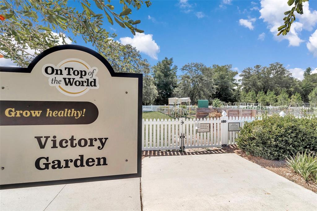 8877 Southwest 96th Street, Unit B Ocala, FL 34481 - Photo 42 of 48 a view of outdoor space with sign board