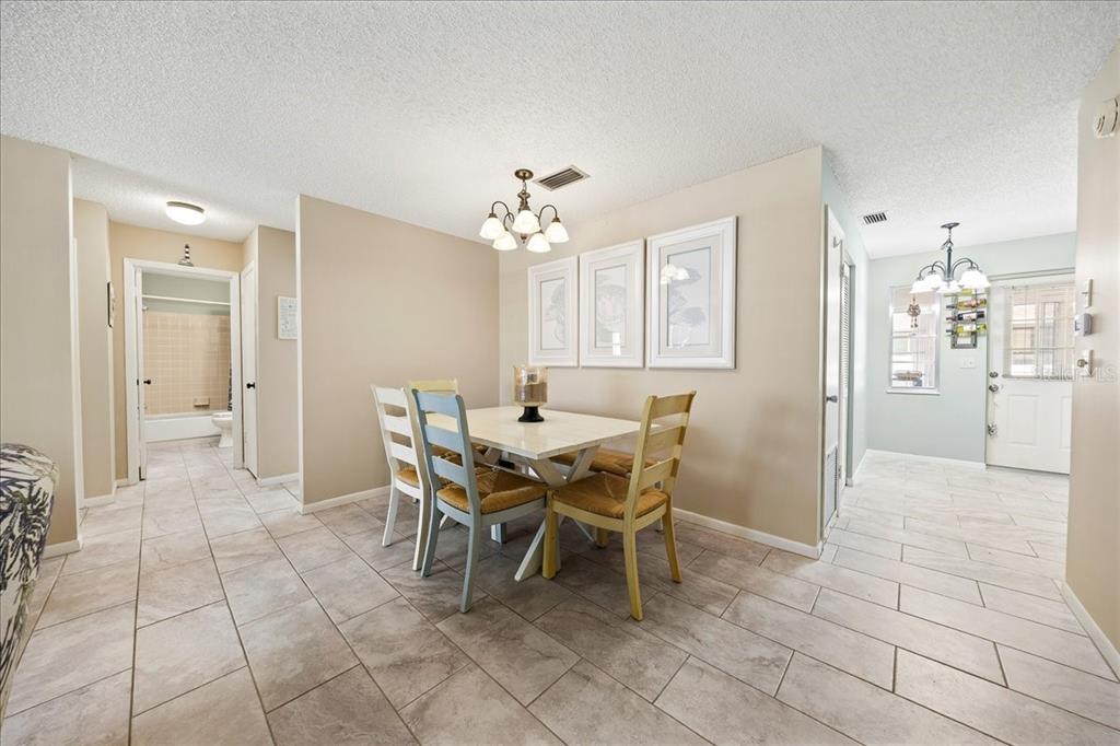 8877 Southwest 96th Street, Unit B Ocala, FL 34481 - Photo 10 of 48 a dining room well furnished