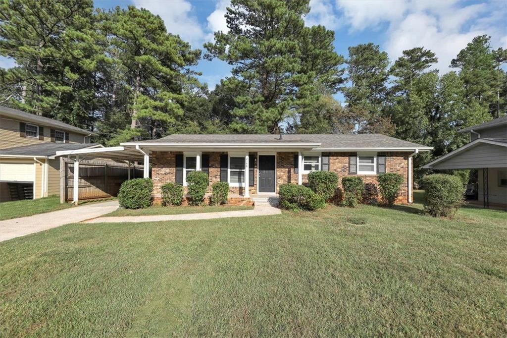 2148 Green Forrest Drive Decatur, GA 30032 - Photo 1 of 1 front view of a house with a patio