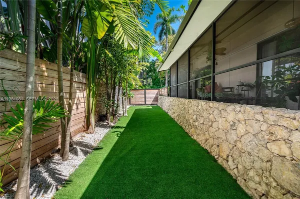 a view of a backyard with a garden