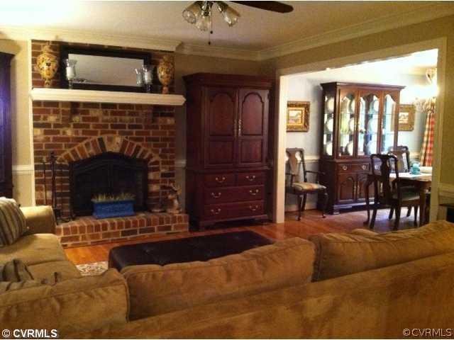 2550 Log Cabin Road Maidens, VA 23102 - Photo 5 of 12 a living room with furniture and a fireplace