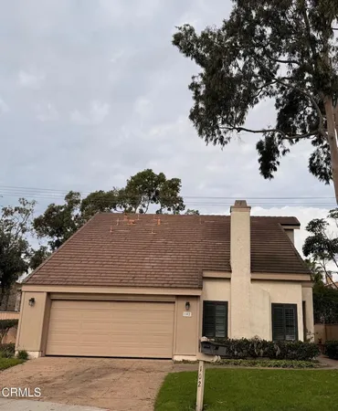 a view of house with yard