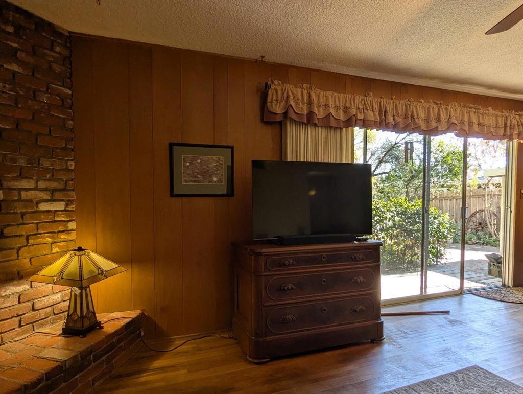 10309 Challenge Boulevard La Mesa, CA 91941 - Photo 11 of 51 a living room with furniture and a flat screen tv